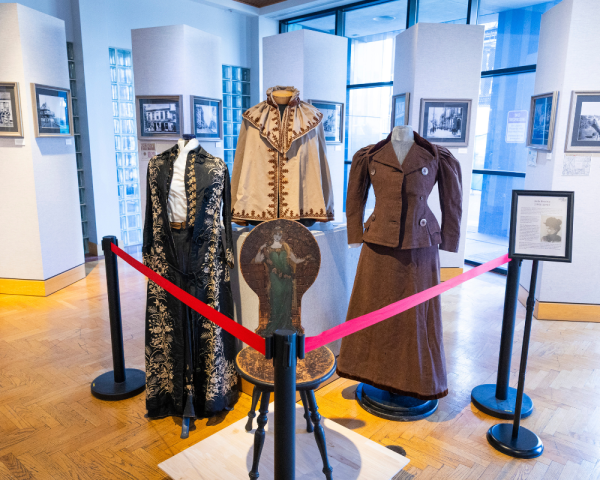 Three featured dresses on display at the Collected Memory exhibit, a local history exhibit commemorating 250 years of Lexington. Includes items from the library’s Kentucky Room collection, the Lexington History Museum, Keeneland, the University of Kentucky, and local residents.
